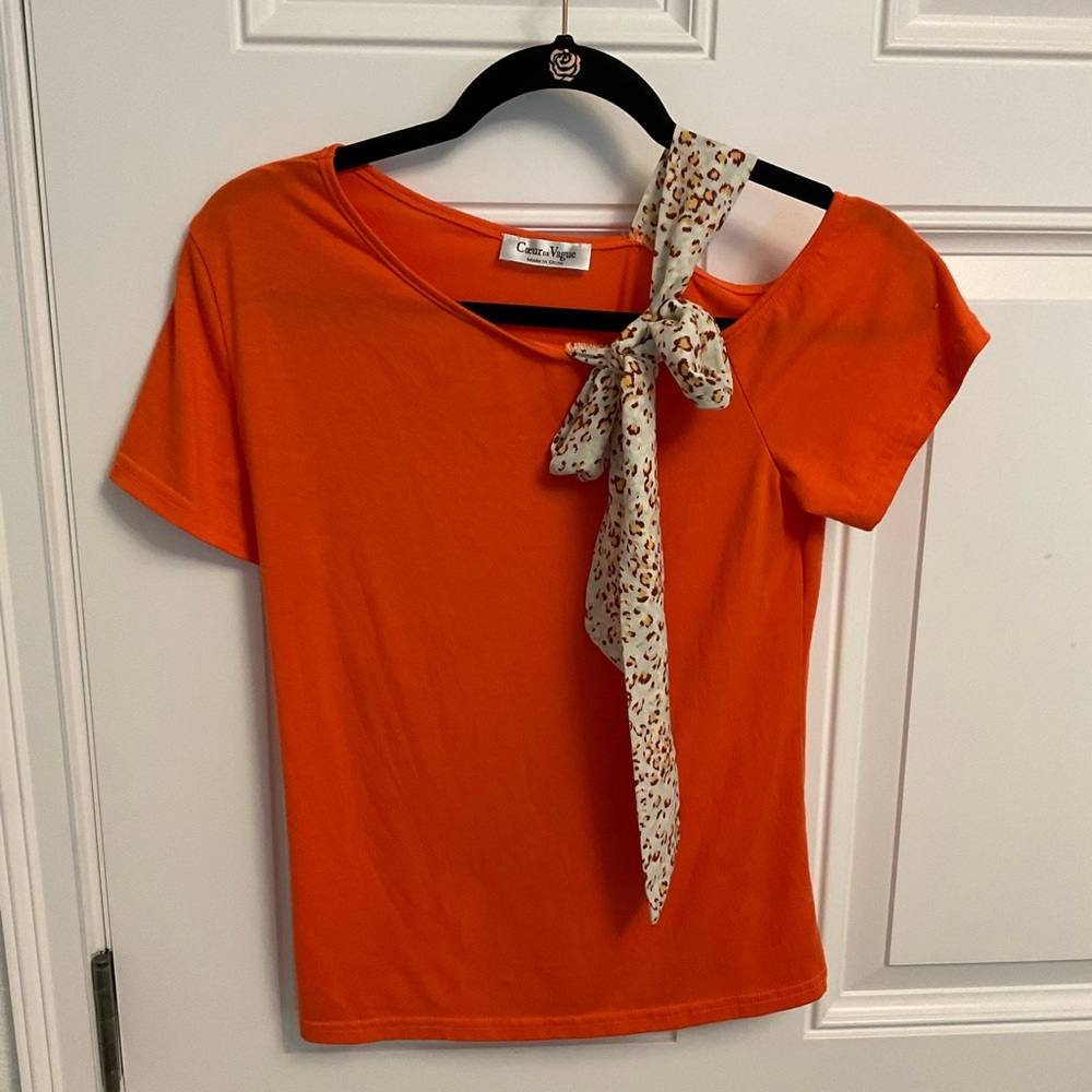 Cute off shoulder medium orange top.  C
